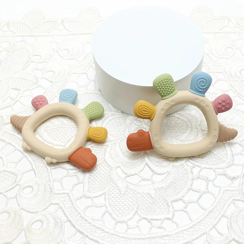 Baby Dinosaur Silicone Teething BPA Free Easy to Grip Infant Care Teether Chewing Toy